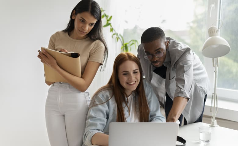 Three people working together